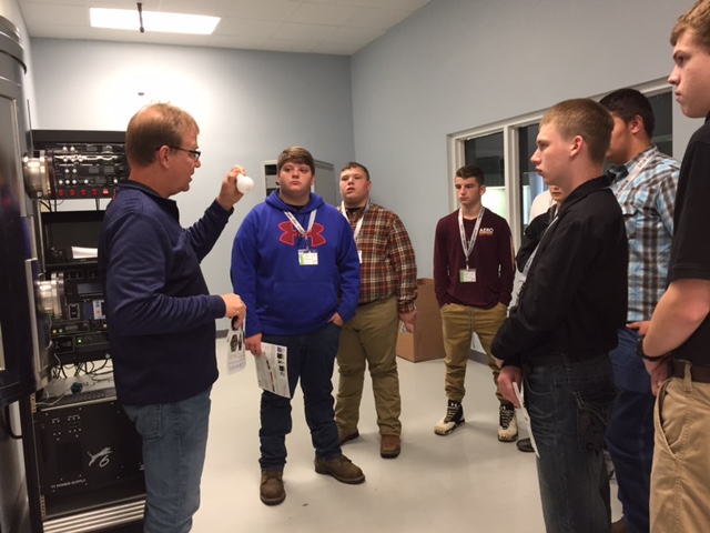 Bedford One Student Tour of tech room at business